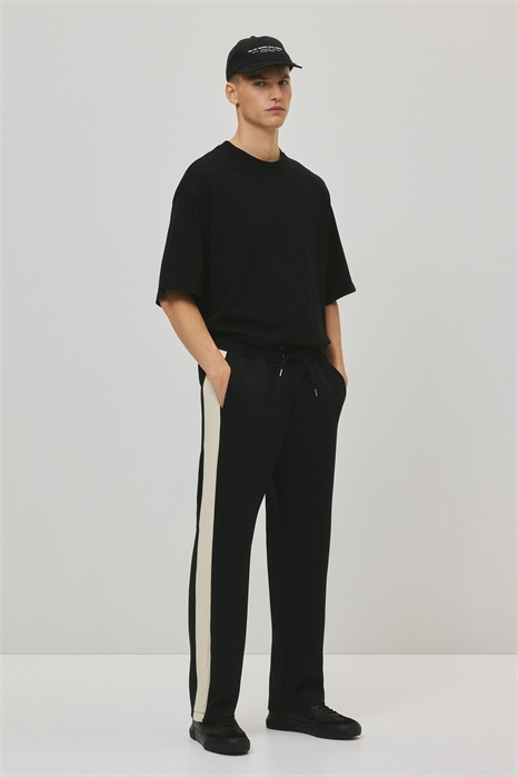 Тренировочные брюки расслабленного кроя с боковыми полосками 1311911001 - Фото 13896562