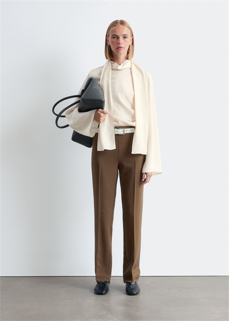 Брюки с зауженными штанинами и складками 1306780002 - Фото 13950227