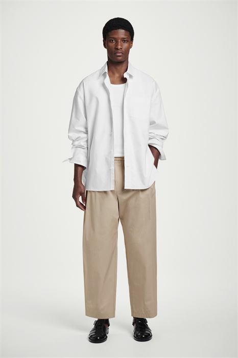 Обрезанные эластичные брюки с широкими штанинами 1272664002 - Фото 14089902