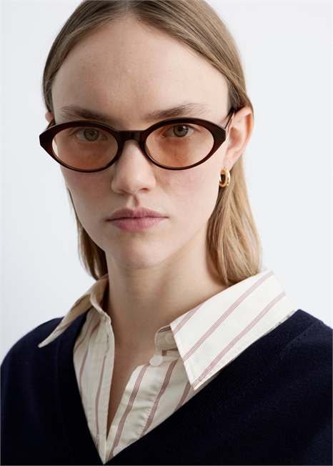 Солнцезащитные очки с овальной оправой артикул 1325788006