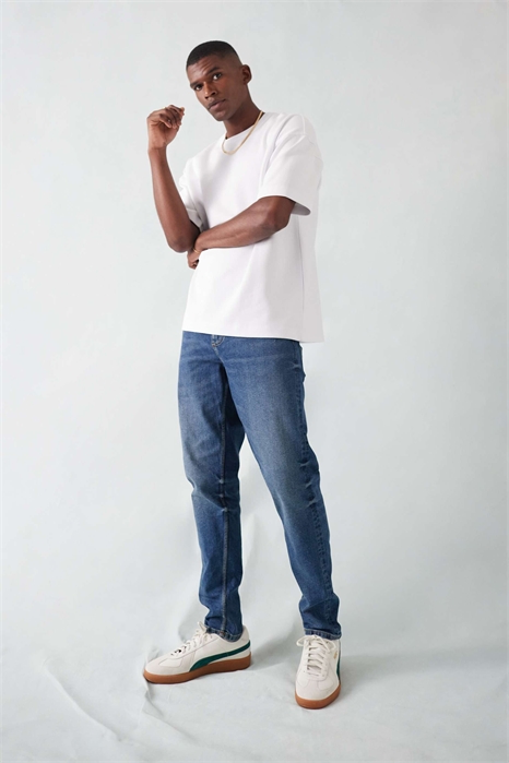 Джинсы с зауженным кроем из эластичного материала артикул 135498781