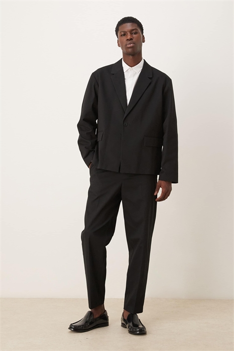 Брюки свободного кроя с зауженными штанинами артикул 150742739