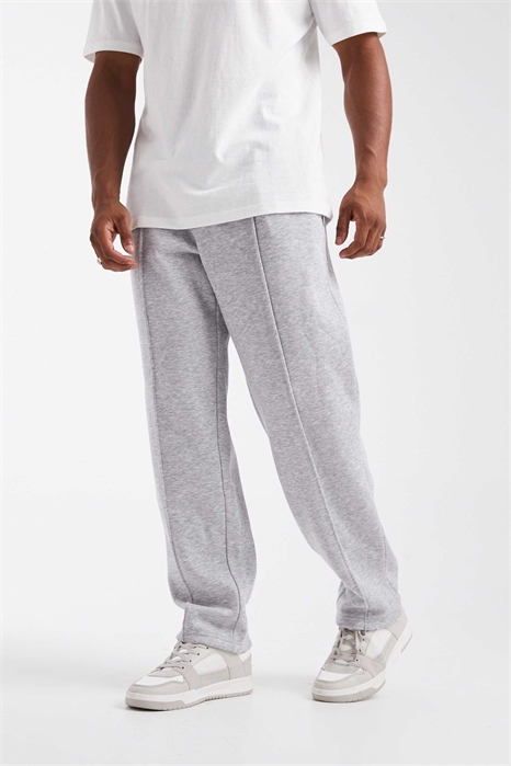 Джоггеры с широкими брючинами и отстрочкой артикул 148852671