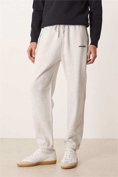 Джоггеры с логотипом и свободными манжетами артикул 155057897