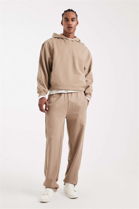 Коллекция Circular Design: джоггеры с прямыми брючинами из плотной ткани артикул 148701773