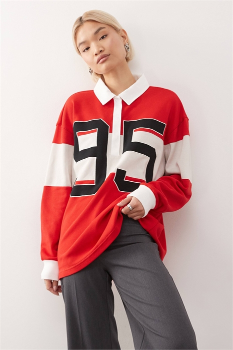 Уличное поло с длинным рукавом и принтом артикул 147134548