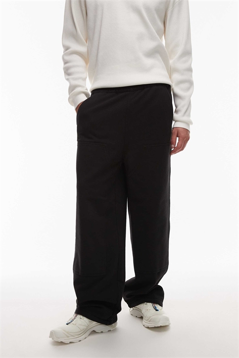 Джоггеры с широкими брючинами и двойным сгибом в области колен артикул 148887077