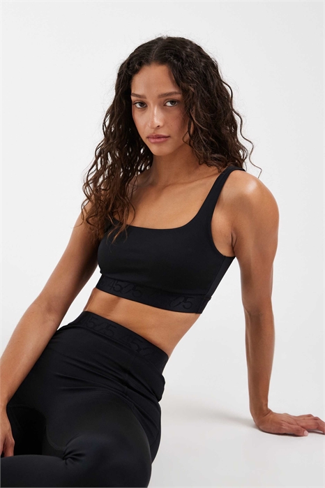 Спортивный бюстгальтер со средней степенью поддержки и жаккардовым логотипом артикул 153283854