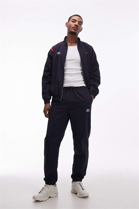 Брюки-треники свободного кроя артикул 154640495