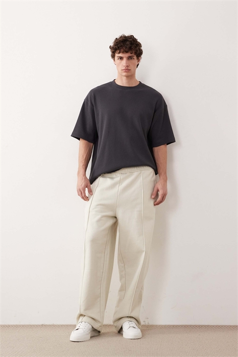 Джоггеры свободного кроя из очень плотной ткани артикул 151778453