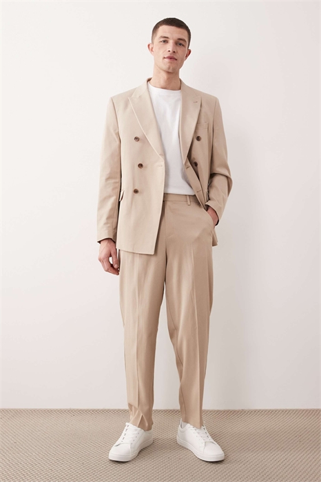 Брюки свободного кроя с зауженными штанинами артикул 153575196