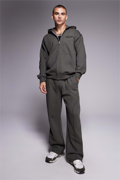 Джоггеры свободного кроя с оверлочной строчкой артикул 151112241