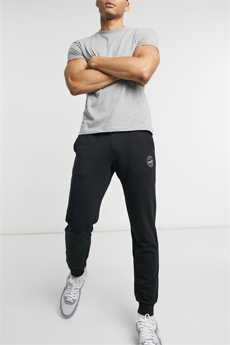 Стильные джоггеры из эластичного материала артикул 1930241