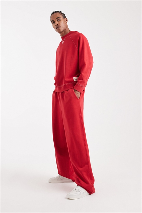 Коллекция Circular Design: джоггеры с прямыми брючинами из плотной ткани, вымытый красный цвет — БУРГУНДСКИЙ артикул 148846910