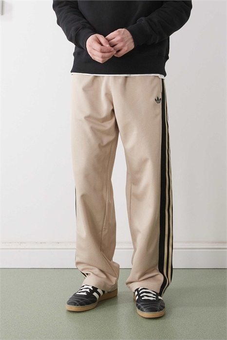 Спортивные штаны из ткани с редким плетением артикул 153695704