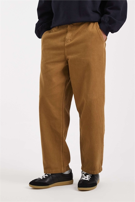 Брюки свободного кроя с зауженными штанинами артикул 152941673