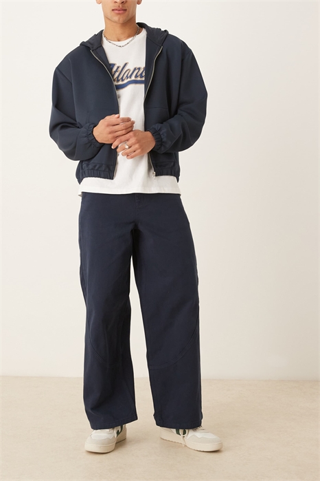 Широкие брюки с швами темно-синего цвета артикул 146734476