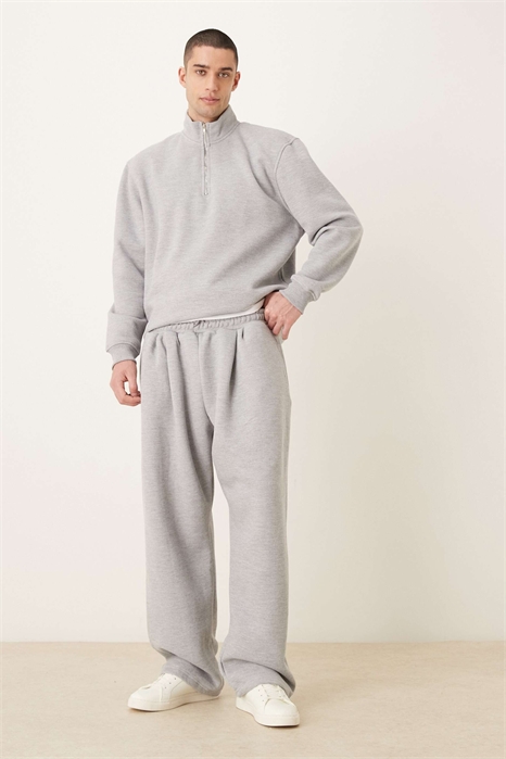 Удобные джоггеры из пике с широкими брючинами и отворотными манжетами артикул 153832254