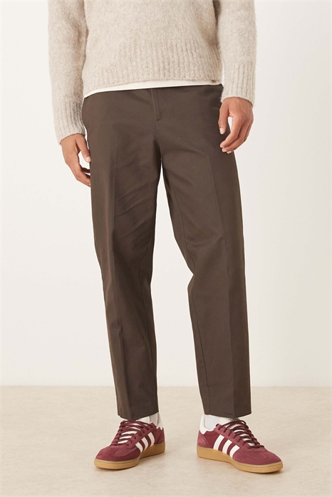 Брюки свободного кроя с зауженными штанинами из 100% хлопка артикул 151524290