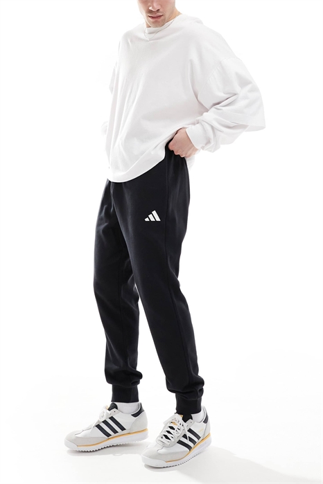 Уютные брюки из махровой ткани adidas Essentials артикул 143319363