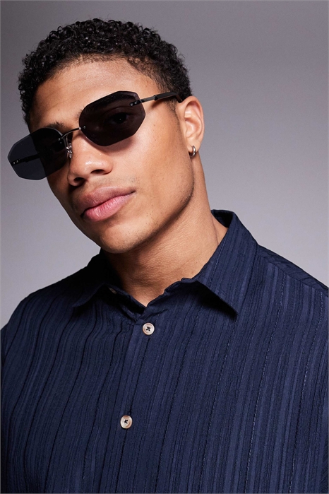 Солнцезащитные очки без оправы с черными стеклами и серебристой металлической оправой артикул 140415783