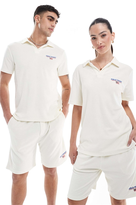 Спортивная рубашка-поло из легкой хлопковой махровой ткани с небольшим логотипом на груди артикул 141104757