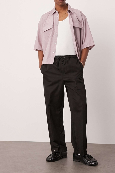 Брюки-кльош с застежками-кнопками на подоле артикул 138066996