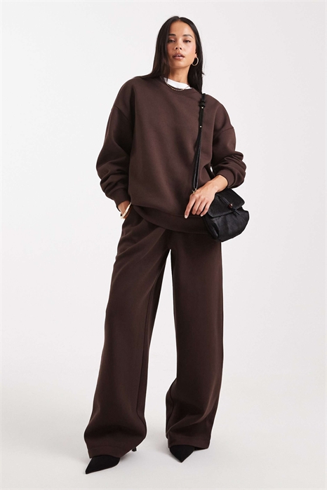 Джоггеры с широкими брючинами и отворотными манжетами артикул 147082701