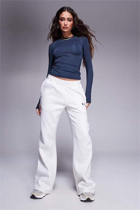 Широкие джоггеры из хлопковой смеси с вышитым логотипом артикул 142045630