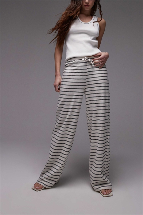 Брюки с широкими брючинами и полосками на шнурке артикул 142431244