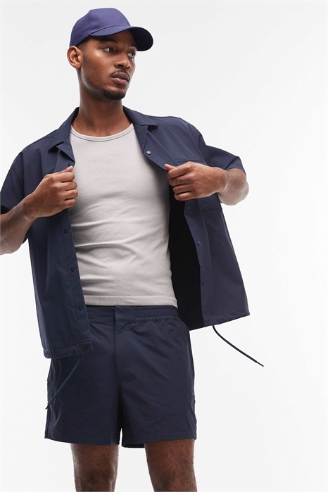 Шорты motionMAX™ с четырехсторонней эластичностью и укороченной длиной co-ord артикул 152666036