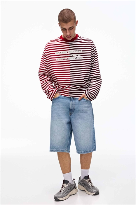 Шорты-бермуды из джинсовой ткани свободного кроя артикул 155780769