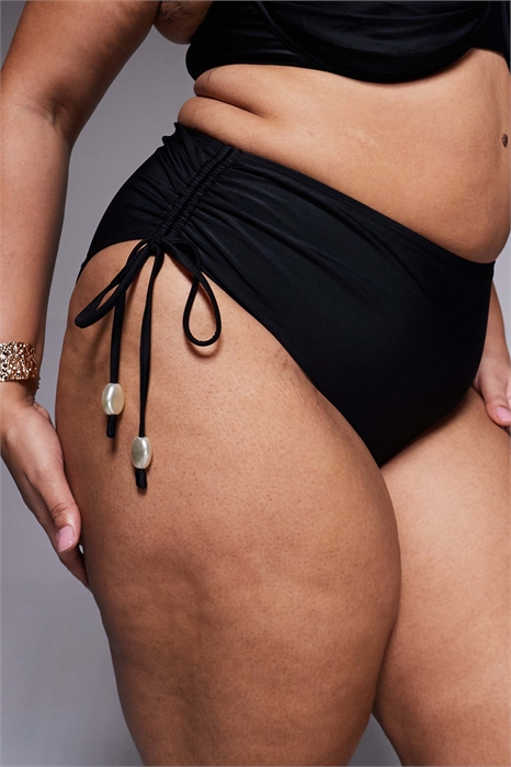 ASOS DESIGN Curve Sadie Azores — бикини-трусики с высокой талией, рюшами по бокам, завязками и жемчужными элементами артикул 152557705