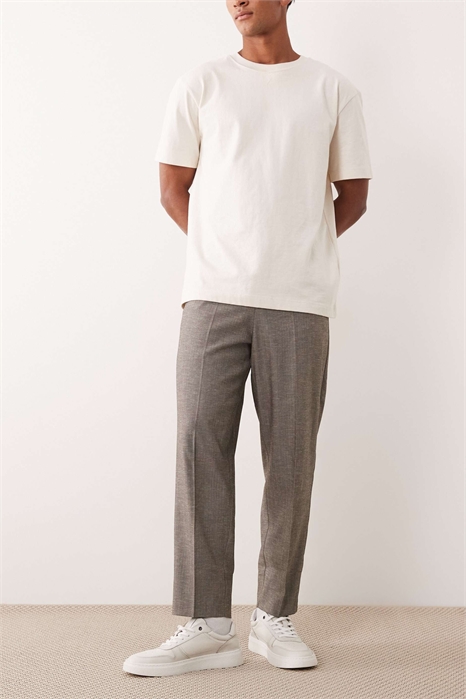 Стильные брюки свободного кроя с зауженными штанинами артикул 149108798