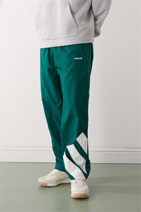 Спортивные штаны Adicolor с блочным принтом артикул 153694926