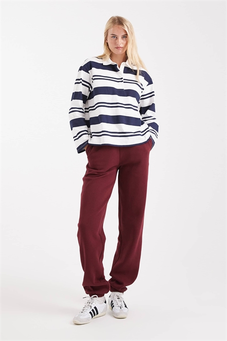 ASOS DESIGN Длинные джоггеры с отворотами и заутюженной задней частью, бордовые артикул 147904632