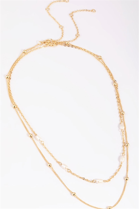 Многоярусное колье с пресноводными жемчужинами в позолоте артикул 152361582