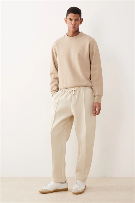 Джоггеры свободного кроя с зауженными штанинами артикул 151525854