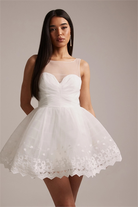 Мини-платье от Hilda Bridal с открытыми плечами, прозрачными вставками, вырезом «сердце» и пышной юбкой артикул 153757164