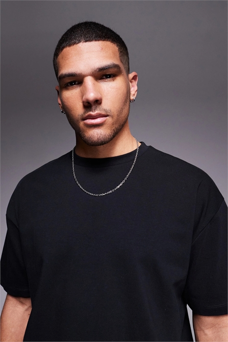 Объемная футболка свободного кроя артикул 135928585