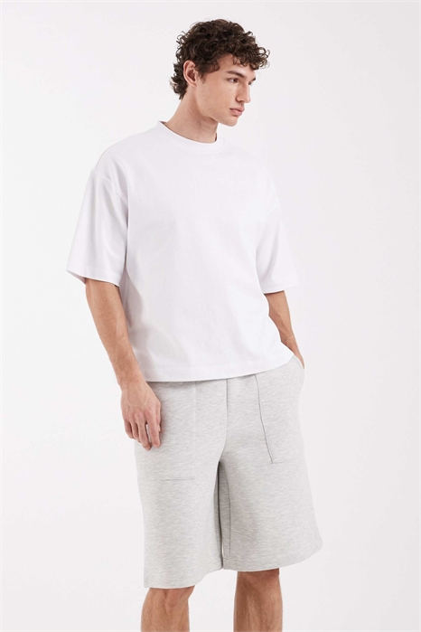 Шорты-джинсы оверсайз из плотной ткани в стиле дайвинга артикул 156160921