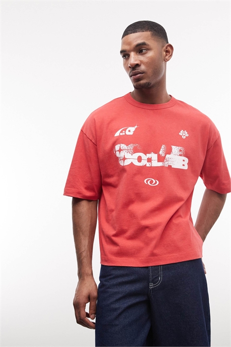 Объемная футболка свободного кроя с футбольным принтом артикул 156130242