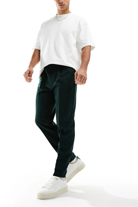 Стильные брюки зауженного кроя артикул 132665464