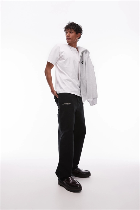 Брюки с принтом на одном колене артикул 146695328