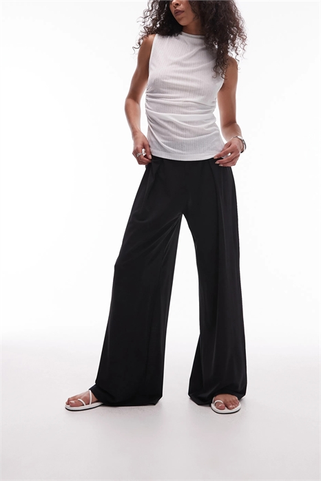 Брюки с эластичным поясом и широкими брючинами из эластичного материала артикул 144136689