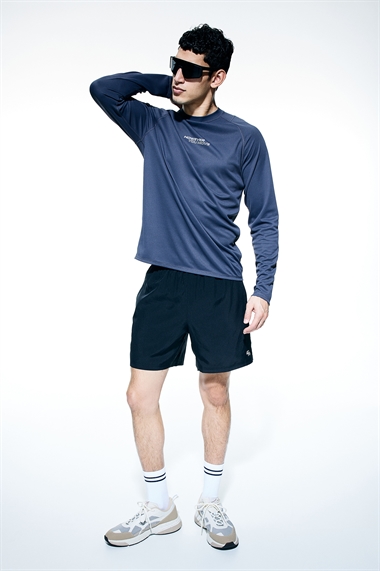 Спортивные шорты DryMove™ из тканого материала с карманами