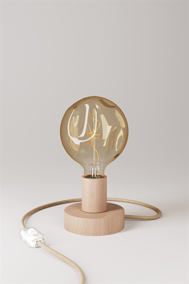 Настольная лампа из дерева с лампочкой в виде бугорка