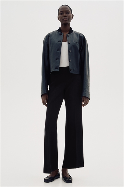 Расклешенные брюки со складками 1266356001