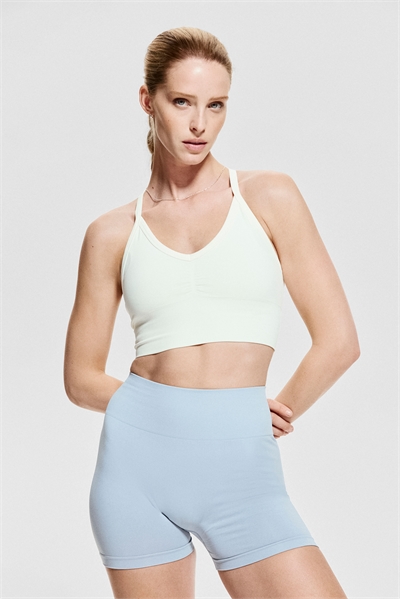 Бесшовный спортивный бюстгальтер средней степени поддержки с DryMove™ 1265871002