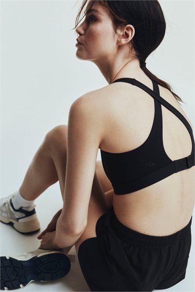 Спортивный бюстгальтер средней поддержки с DryMove™ 1294761002